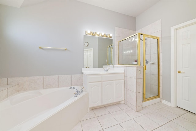 bathroom featuring tile patterned floors, vanity, and independent shower and bath