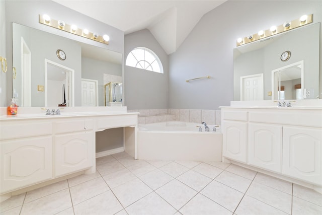 bathroom with tile patterned flooring, vanity, lofted ceiling, and shower with separate bathtub