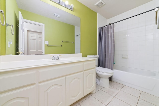 full bathroom featuring tile patterned flooring, vanity, shower / bath combination with curtain, and toilet