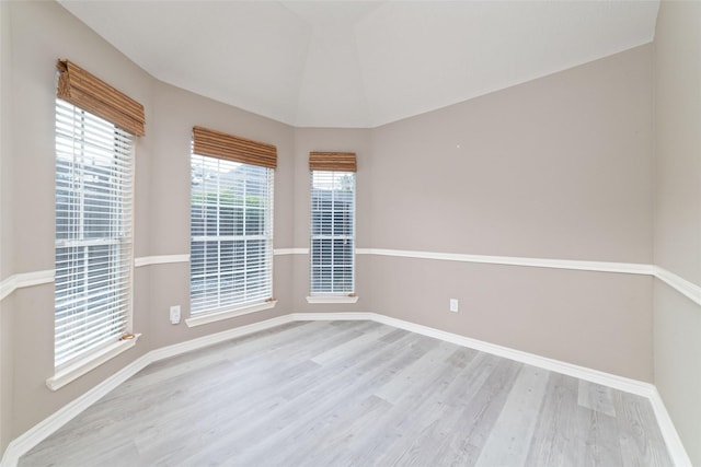 spare room featuring light hardwood / wood-style flooring