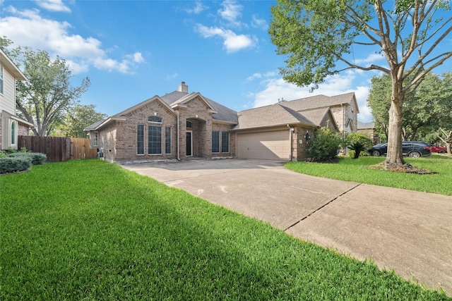 single story home with a front yard and a garage