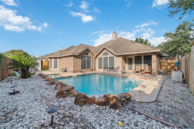 view of pool featuring a patio