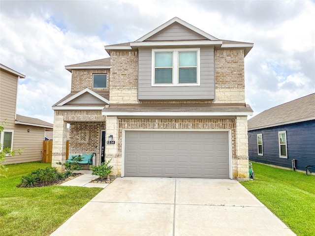 view of front of house featuring a garage and a front lawn