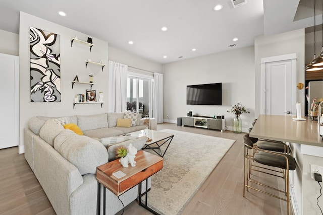 living room featuring light hardwood / wood-style flooring