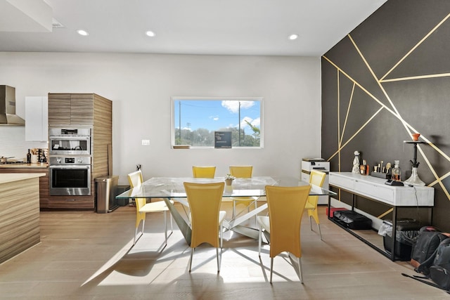 dining room featuring light hardwood / wood-style floors