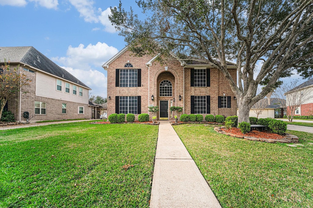 view of front property with a front yard