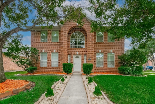 view of front facade with a front yard