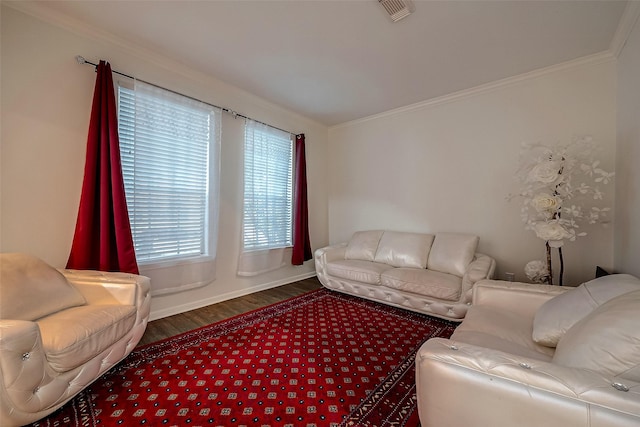 living room featuring dark hardwood / wood-style floors and ornamental molding