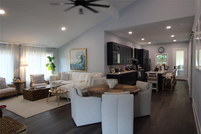 living room featuring vaulted ceiling with beams, ceiling fan, and dark hardwood / wood-style flooring