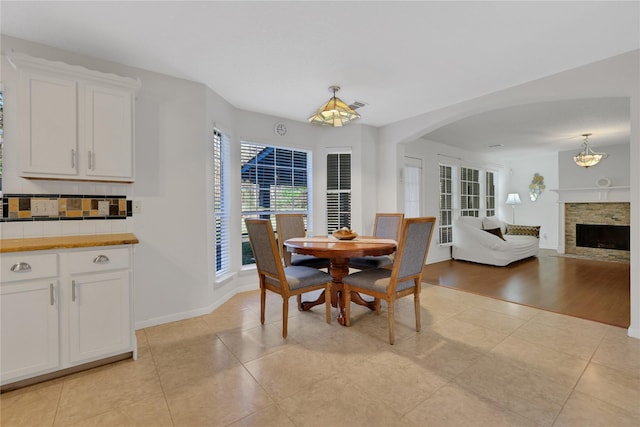 dining area featuring light tile patterned floors