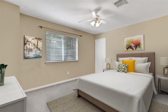 carpeted bedroom with ceiling fan