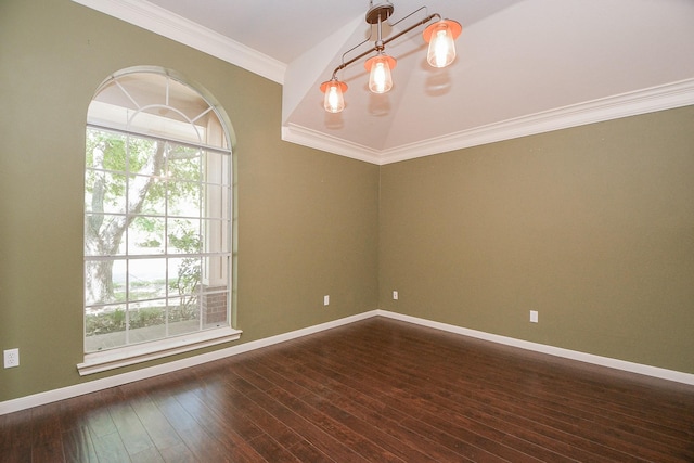 spare room featuring crown molding, dark wood-type flooring, vaulted ceiling, and an inviting chandelier