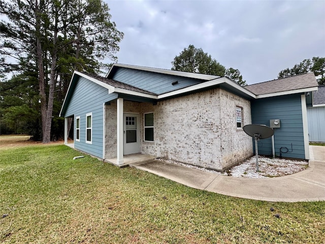 exterior space with a front lawn