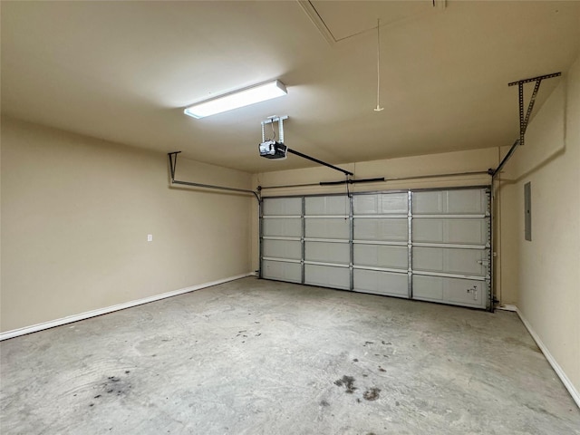 garage featuring a garage door opener and electric panel