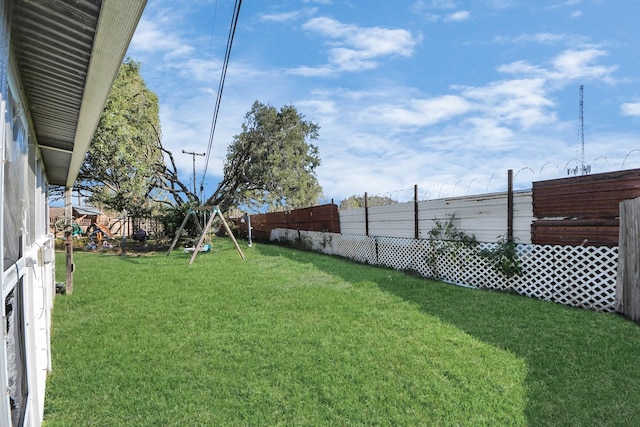 view of yard featuring a playground