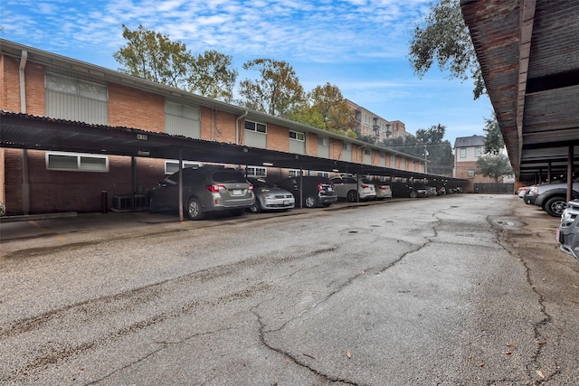 view of parking / parking lot with a carport