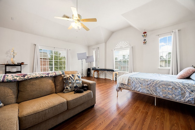 bedroom featuring lofted ceiling, hardwood / wood-style floors, and ceiling fan