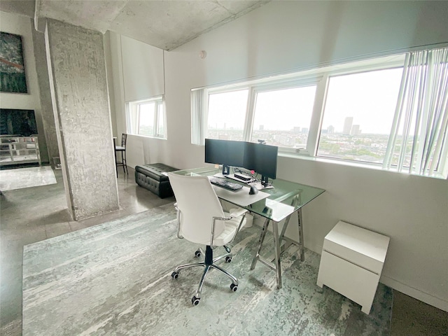 office space with concrete floors