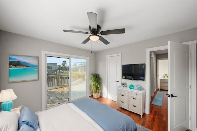 bedroom featuring ceiling fan, dark hardwood / wood-style flooring, and access to outside