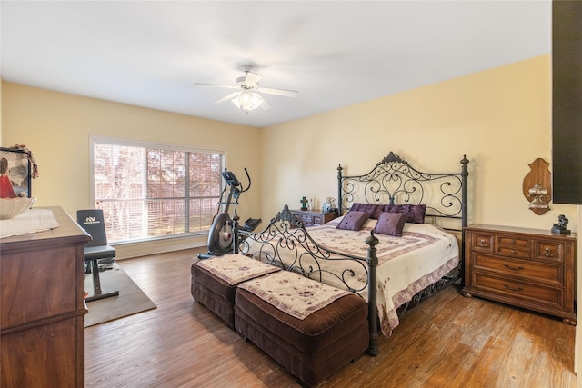 bedroom featuring hardwood / wood-style floors and ceiling fan