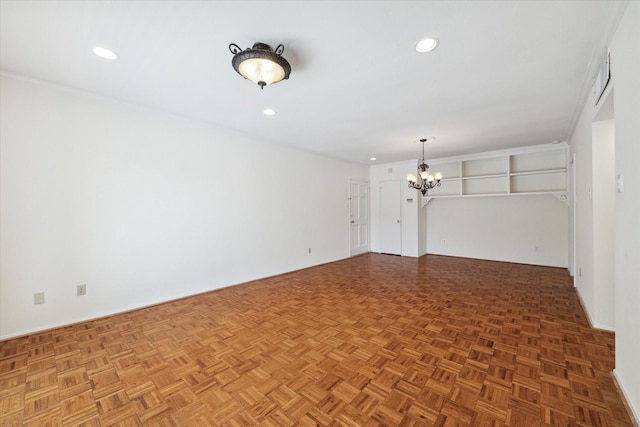 unfurnished living room featuring parquet floors and a notable chandelier