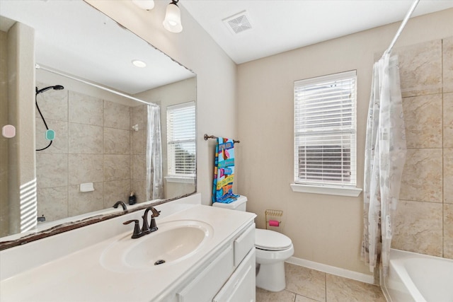 full bathroom with tile patterned floors, vanity, toilet, and shower / tub combo with curtain