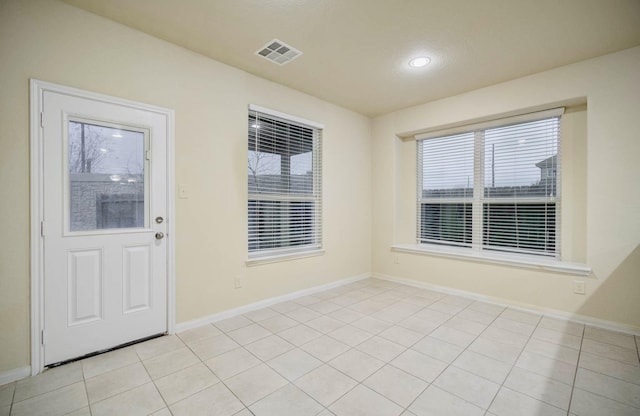 view of tiled entrance foyer