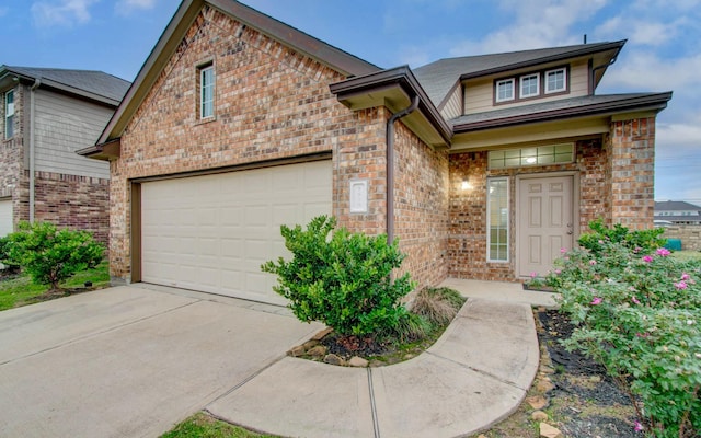 view of front of property with a garage