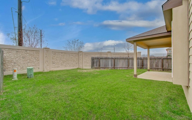 view of yard with a patio area