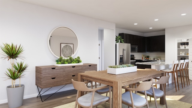 dining area featuring dark hardwood / wood-style floors