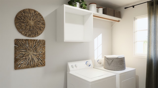 laundry area featuring washing machine and clothes dryer