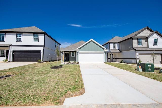 view of front of home with concrete driveway and a front yard