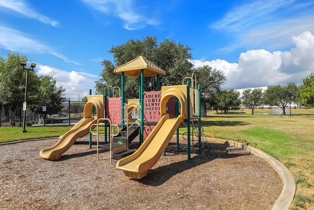 view of playground featuring a yard