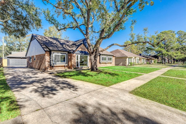 ranch-style house with a front yard and a garage