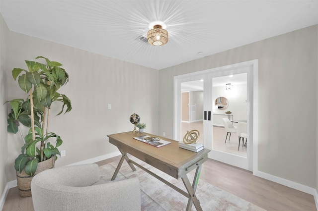 office featuring light hardwood / wood-style floors