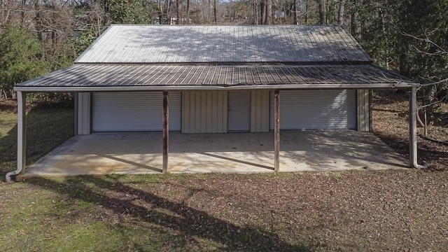 garage featuring a carport