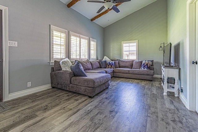 living room with beamed ceiling, wood-type flooring, high vaulted ceiling, and ceiling fan