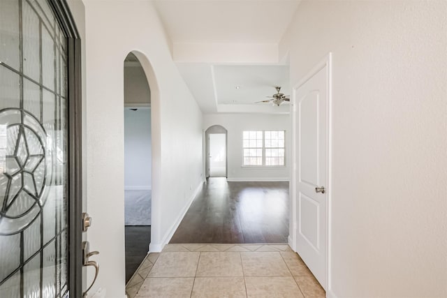 hallway featuring light tile patterned flooring