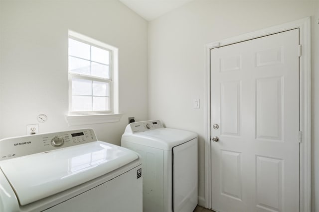 washroom featuring separate washer and dryer