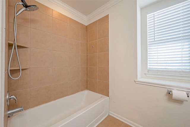 bathroom with tile patterned floors, tiled shower / bath combo, plenty of natural light, and crown molding