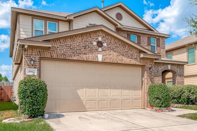 view of front of property featuring a garage