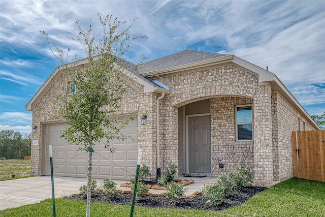 view of front of home with a garage