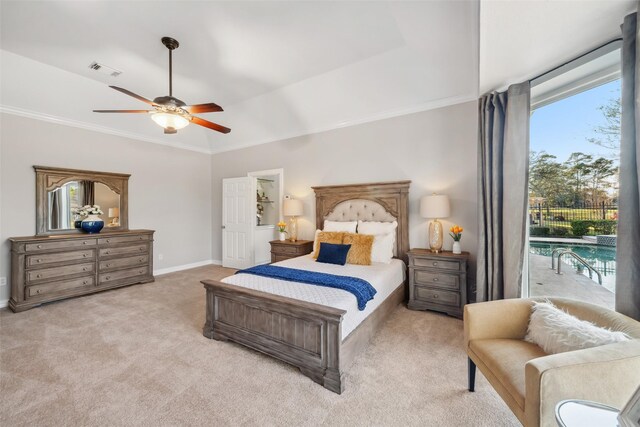 carpeted bedroom featuring ceiling fan, access to exterior, and multiple windows