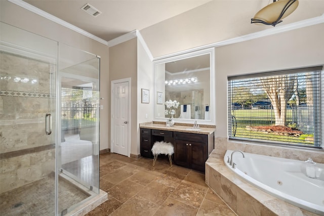 bathroom featuring separate shower and tub, vanity, and ornamental molding