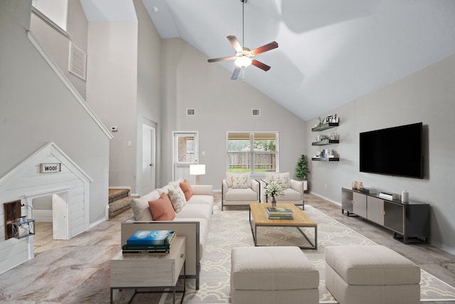 living room with high vaulted ceiling and ceiling fan