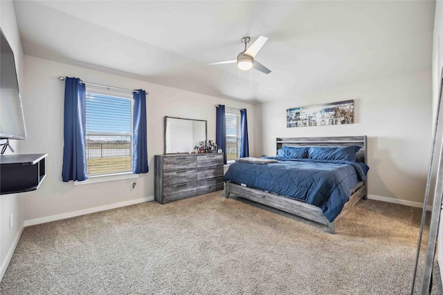 bedroom with ceiling fan and carpet floors