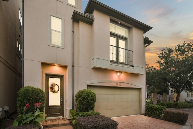 view of front of property with a garage