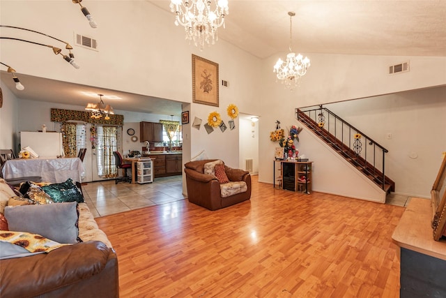 living room featuring hardwood / wood-style flooring and lofted ceiling