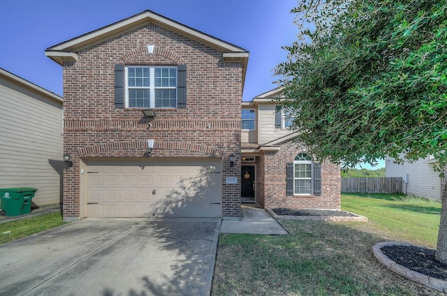 view of property with a front yard and a garage