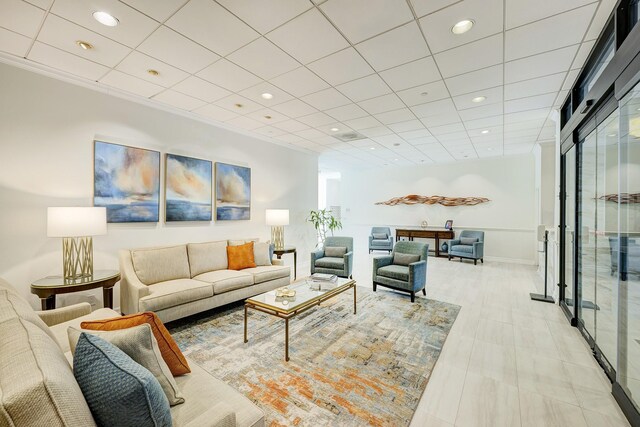 living room featuring crown molding